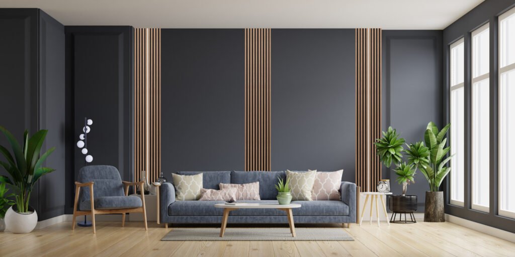 The interior has a sofa and armchair on empty dark wall background,3D rendering
