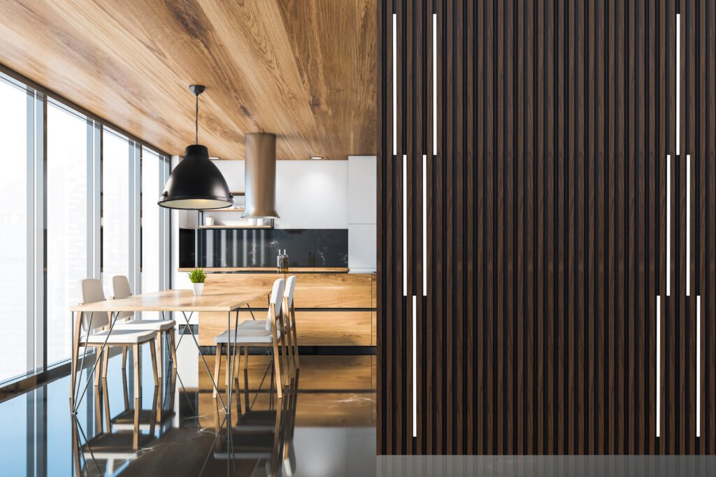 Interior of luxury panoramic kitchen with white and black marble marble walls, white countertops, wooden island and long dining table with chairs. Mock up wall to the right. 3d rendering